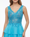 Turquoise Gown with Tiered Layers and Crystal Embroidery